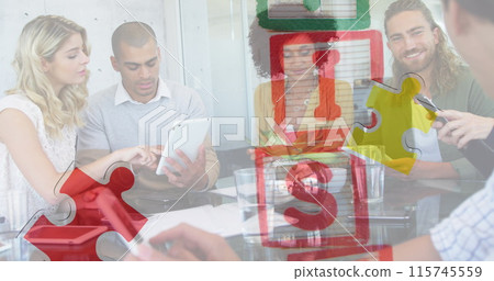 Image of colourful puzzle pieces and autism text over work colleagues using tablets Image of colourful puzzle pieces and autism text over work colleagues using tablets 115745559