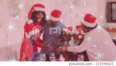 Image of snow falling over smiling family with santa hats using smartphone Image of snow falling over smiling family with santa hats using smartphone 115745623