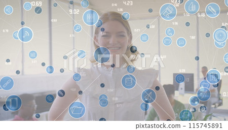 Image of icons over caucasian businesswoman smiling at camera in office Image of icons over caucasian businesswoman smiling at camera in office 115745891