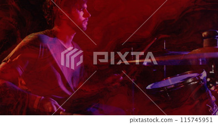 Image of glowing red lights over mid section of caucasian man playing drums Image of glowing red lights over mid section of caucasian man playing drums 115745951