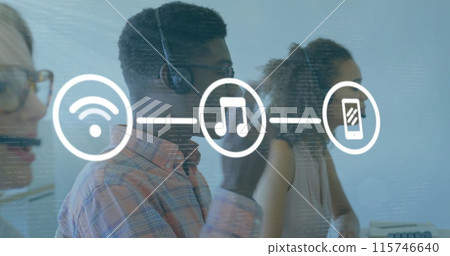 Image of media icons over diverse business people using phone headsets in office Image of media icons over diverse business people using phone headsets in office 115746640
