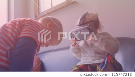 Image of smiling caucasian siblings playing with vr headset Image of smiling caucasian siblings playing with vr headset 115747218