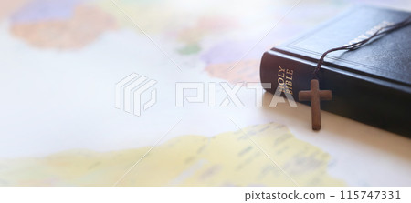 The holy cross of Jesus Christ, the Bible and world map background with mission, gospel and evangelism concept The holy cross of Jesus Christ, the Bible and world map background with mission, gospel and evangelism concept 115747331