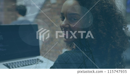 Image of data processing over african american woman using computer against network towers Image of data processing over african american woman using computer against network towers 115747935