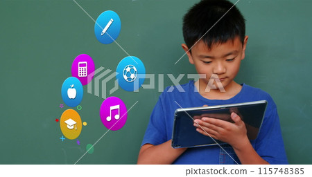 Image of colorful icons over asian boy using tablet Image of colorful icons over asian boy using tablet 115748385