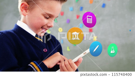 Image of colorful icons over caucasian schoolboy using tablet 115748400