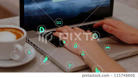 Image of icons over coffee cup and cropped hands of caucasian woman working on laptop in cafes Image of icons over coffee cup and cropped hands of caucasian woman working on laptop in cafes 115748608