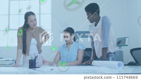 Image of icon in circles over diverse female architects working on floor plan in office 115748669