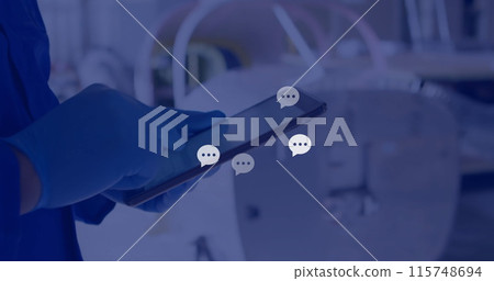 Image of network of connections with icons over caucasian male doctor using tablet 115748694