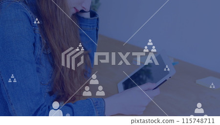 Image of network of connections with icons over caucasian woman using tablet Image of network of connections with icons over caucasian woman using tablet 115748711