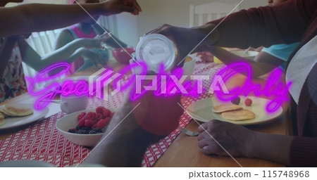 Image of good vibe only text over african american family eating meal together in the kitchen Image of good vibe only text over african american family eating meal together in the kitchen 115748968