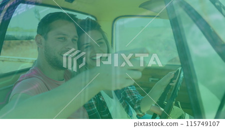 Image of digital data processing over two caucasian people in car Image of digital data processing over two caucasian people in car 115749107