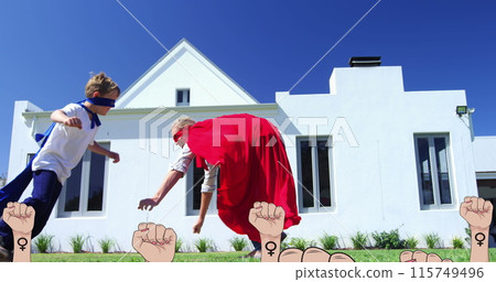 Image of female fists over flower and mom playing with son Image of female fists over flower and mom playing with son 115749496