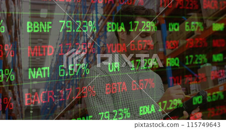 Stock market data processing against caucasian male supervisor checking stock at warehouse 115749643