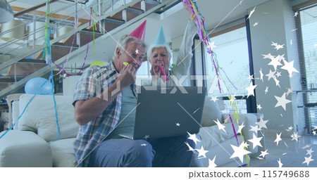Image of white stars over happy caucasian senior couple making celebration laptop image call Image of white stars over happy caucasian senior couple making celebration laptop image call 115749688