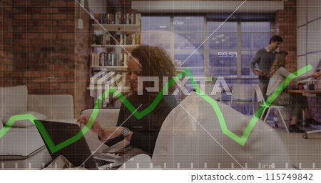 Image of financial data over biracial businesswoman working on laptop in office 115749842