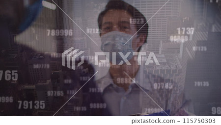 Image of cityscape and data processing over diverse business people wearing face masks 115750303
