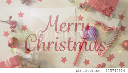 Image of christmas greetings text over envelope, christmas presents and decorations Image of christmas greetings text over envelope, christmas presents and decorations 115750624