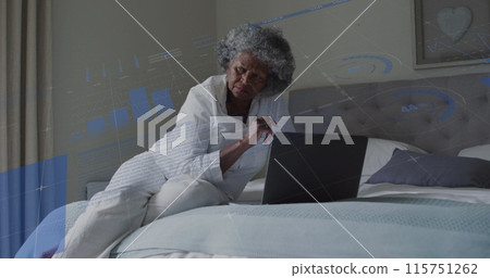 Image of data processing over senior african american woman using laptop Image of data processing over senior african american woman using laptop 115751262