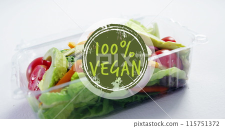 Image of 100 percent vegan text over box with fresh vegetables Image of 100 percent vegan text over box with fresh vegetables 115751372