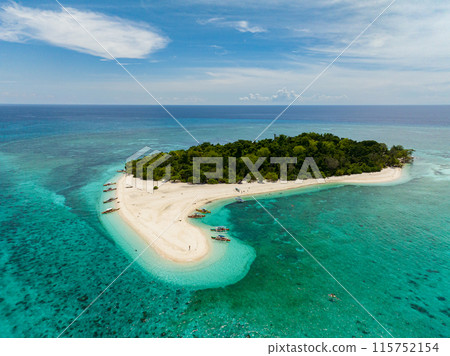 Beach with sandbar in Mantigue Island, coastal with boats. Camiguin, Philippines. Travel destination. 115752154