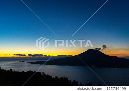 Sakurajima and the sunrise as seen from Terayama Park Observatory (Kagoshima City) Sakurajima and the sunrise as seen from Terayama Park Observatory (Kagoshima City) 115756499