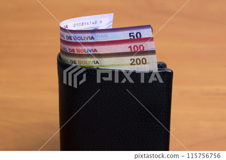 Bolivian boliviano in the black wallet 115756756