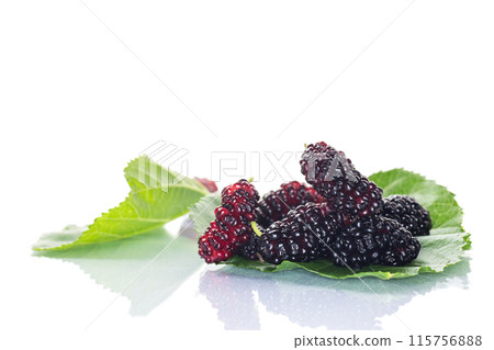 ripe black mulberry berries with leaves, isolated on white background 115756888