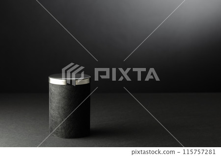 Black podium on a black background. Black podium on a black background. 115757281