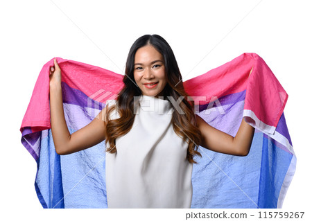 Attractive young woman holding bisexual flag isolate white background. Human rights, freedom and equality concept Attractive young woman holding bisexual flag isolate white background. Human rights, freedom and equality concept 115759267