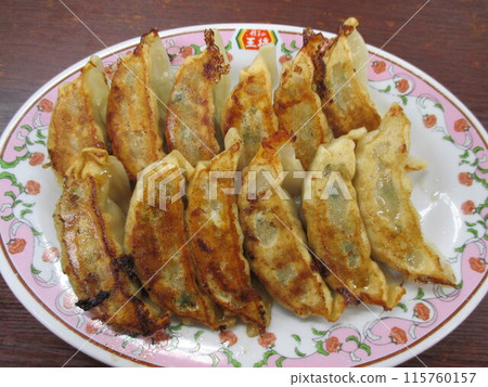 Delicious looking gyoza from the popular Chinese food chain "Gyoza no Ohsho" 115760157