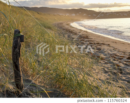 Beautiful sunset at Portnoo Narin beach in County Donegal - Ireland Beautiful sunset at Portnoo Narin beach in County Donegal - Ireland 115760324