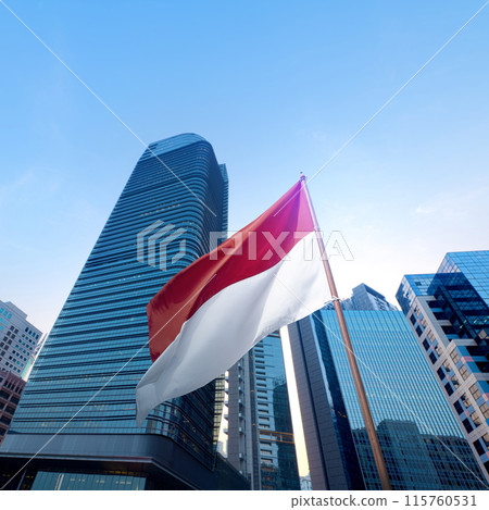 Indonesian flag waving in modern city center Indonesian flag waving in modern city center 115760531