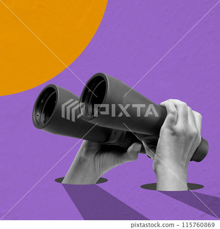 A human hand holding the binoculars A human hand holding the binoculars 115760869