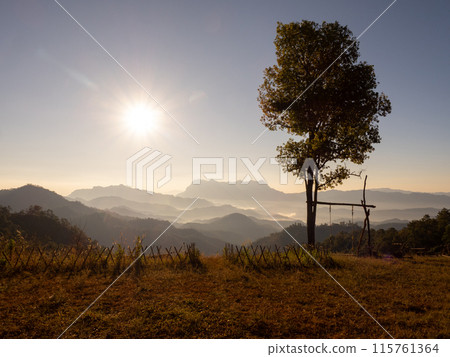 Doi Luang Chiang Dao mountain at dawn with golden hour sunrise sky. Chiang Mai - Thailand 115761364
