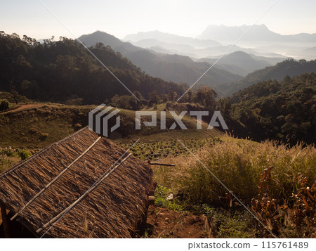 Doi Luang Chiang Dao mountain at dawn with golden hour sunrise sky. Chiang Mai - Thailand 115761489
