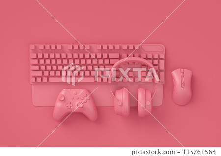 Modern home office setup featuring keyboard, gaming controllers and headphones 115761563