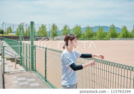Woman exercising in the park, sportswear, health 115763294