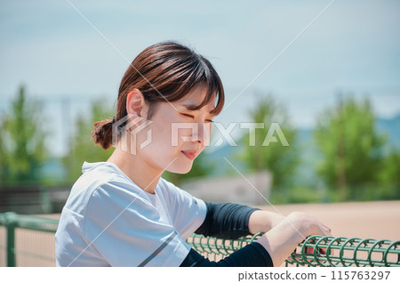 Woman exercising in the park, sportswear, health 115763297