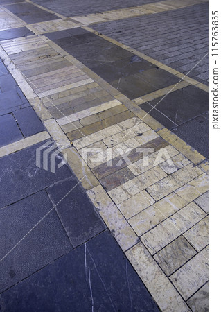 Cobblestone floor with typical shapes of the city of Lisbon Cobblestone floor with typical shapes of the city of Lisbon 115763835