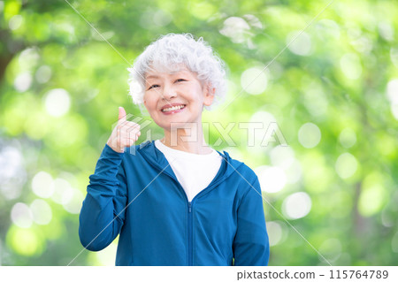 Senior woman in sportswear thumbs up Senior woman in sportswear thumbs up 115764789