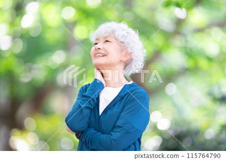 Senior woman in sportswear, fresh greenery Senior woman in sportswear, fresh greenery 115764790