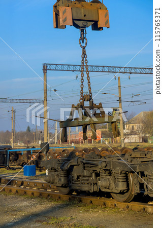 Railway car wheelsets during waiting repair at railway junction 115765371