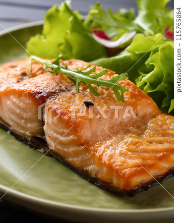 Baked salmon with salad meal 115765864
