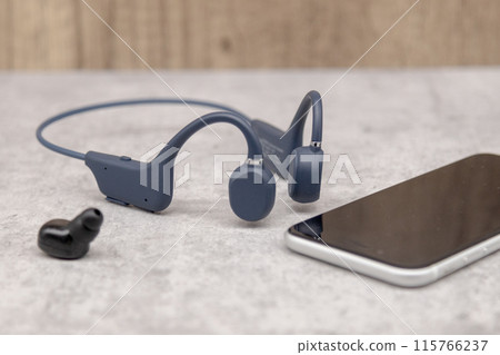 Bone conduction earphones, Bluetooth earphones and smartphone Bone conduction earphones, Bluetooth earphones and smartphone 115766237