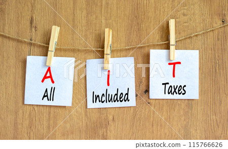 AIT All included taxes symbol. Concept words AIT All included taxes on beautiful white paper. Beautiful wooden background. Business AIT all included taxes concept. Copy space. 115766626