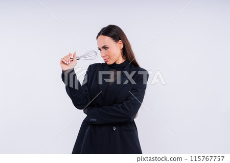 Young thoughtful pensive wistful fun housewife. Cooking food process concept. 115767757