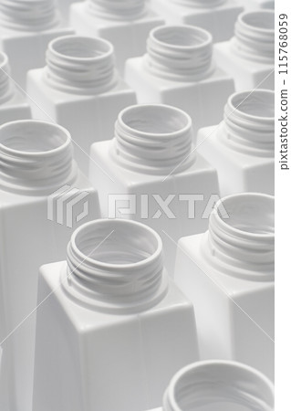 Large group of empty white plastic bottles Large group of empty white plastic bottles 115768059