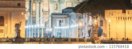 Rome, Italy. St. Peter's Square With Papal Basilica Of St. Peter In The Vatican And Aelian Bridge In Evening Night Illuminations 115768418