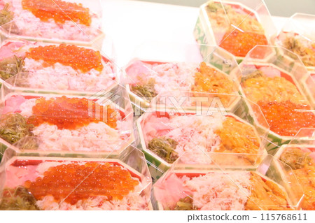 A luxurious Hokkaido seafood bowl lunch with plenty of crab and salmon roe. 115768611